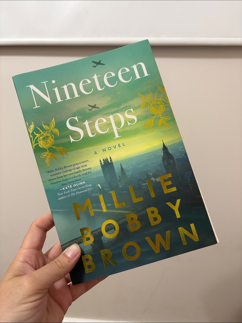 Nineteen Steps by Millie Bobby Brown - Green & Gold paperback Novel